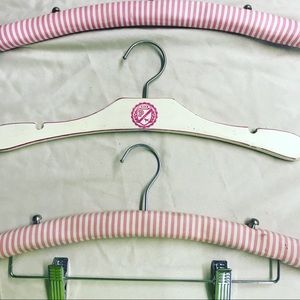 Victoria’s Secret and pink hangers .14 for a dozen